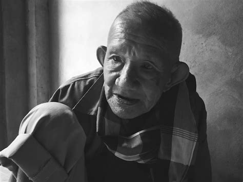 Premium Photo Portrait Of Mature Man Sitting At Home
