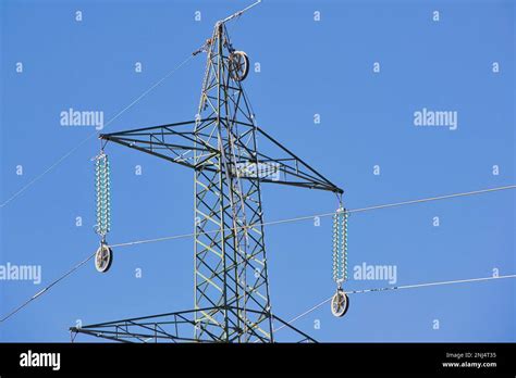 Iron Pylon With High Voltage Cable Insulators Stock Photo Alamy