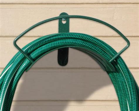 10 Best Garden Hose Storage Solutions Decor Trends And Design News Hgtv