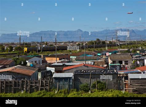 A view of homes in Philippi township in Cape Town, South Africa. One of ...