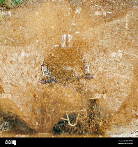 Quad Driver In The Dirt Stock Photo Alamy