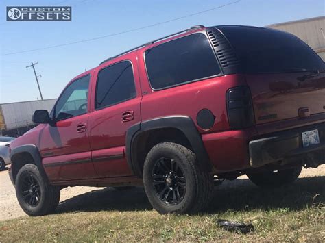 2003 Chevrolet Tahoe With 17x85 25 Mb Wheels Tko And 30565r17 Falken Wildpeak At2 And Leveling