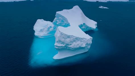 Antarctica Melting Blue Iceberg Drifting Stock Footage SBV 348827491