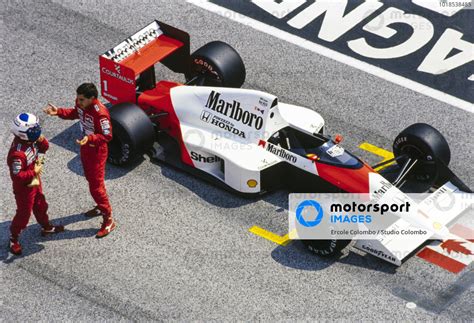 Alain Prost And Ayrton Senna In Discussion On The Grid Next To Senna S