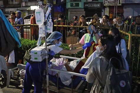 Residents Begin To Return Home After Philippine Quake Kills One The