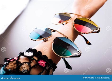 Fashionable Sunglasses With Multicolored Lenses On Hand Stock Image Image Of Object Lenses