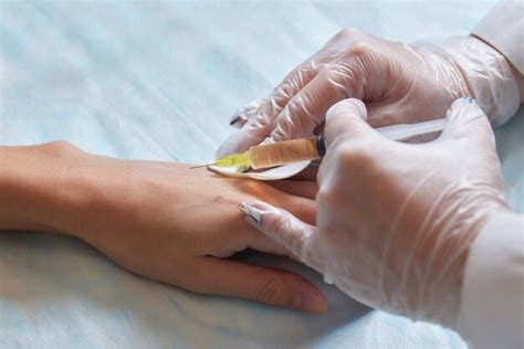 Premium Photo Doctor Doing Stem Cell Therapy On A Patients Elbow