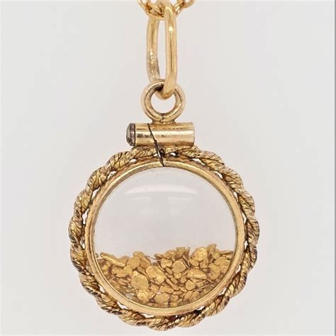 ct yg glass pedant  ct gold flakes auction