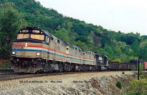 Amtrak F40ph Unit Number 281 Leads A Norfolk Southern Freight At