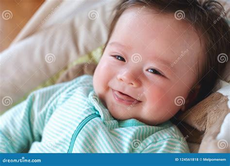 Happy Newborn Baby Boy Sitting In His Swing Stock Photo Image Of