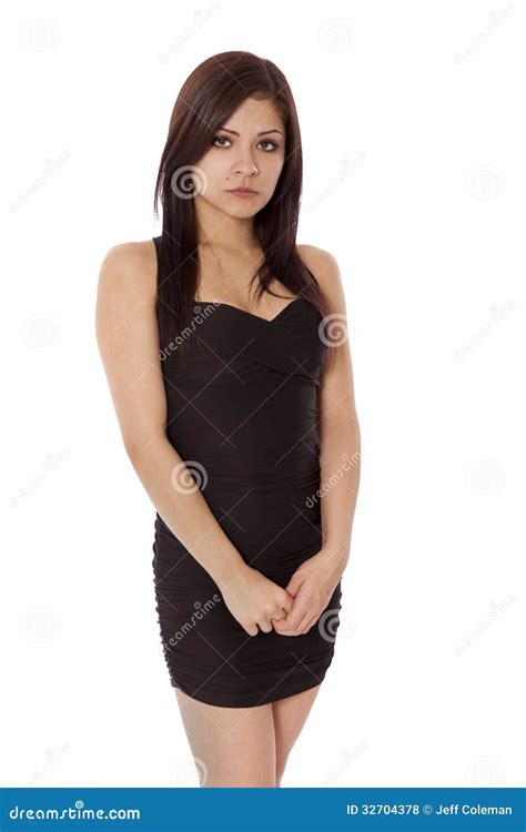 La Jeune Femme Dans Une Peu De Robe Noire Est Triste Photo Stock