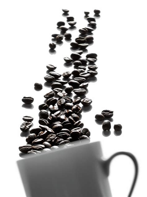 Tasse De Grains De Cafe Renversee Spilt Cup Of Coffee Beans Photograph