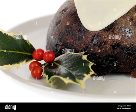 A Traditional Christmas Pudding With Holly And Red Berry Traditional