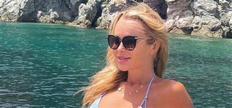 Amanda Holden Flaunts Incredible Figure In Blue Bikini As She