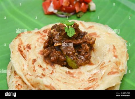 Kerala beef with parotta porotta roti. beef fry beef curry kerala style ...