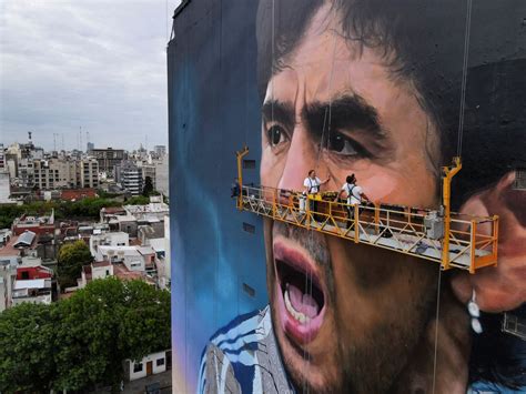 Giant new mural celebrates 'warrior' Maradona in Buenos Aires | Reuters