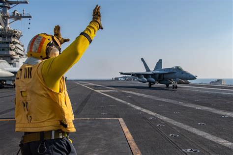 DVIDS Images Sailor Signals To Pilot Image 8 Of 12