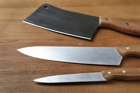 Set of Sharp Kitchen Knives on Table Stock Photo - Image of metal, cutting: 152567510