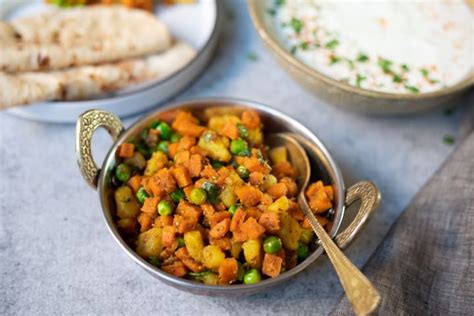 Aloo Gajar Matar Indian Potato Carrots And Peas Piping Pot Curry