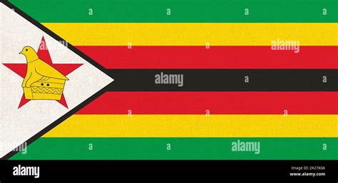 Flag Of Zimbabwe National Zimbabwean Flag On Fabric Surface Stock