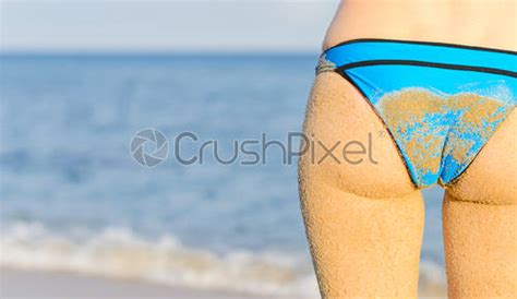 Sexy Bikini Woman Walking On Wooden Plank Between Umbrellas And Stock Photo Crushpixel