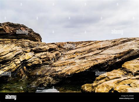 Boulder Rock Wall Formation On A Gloomy Sky Stock Photo Alamy