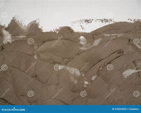 Plastering Cement On A Reinforcing Plastic Grid On A Foam Board Stock