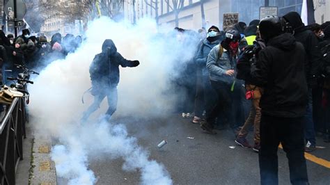 Dozens arrested at French police law protests