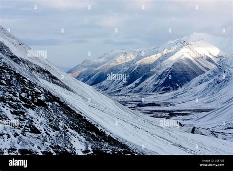 Scenic Snowy Winter Mountainous Landscape From Atigun Pass Brooks