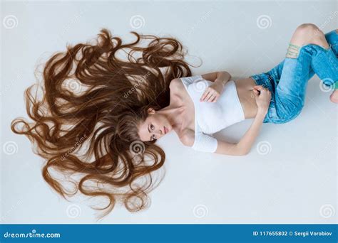 Beauty Close Up Portrait Of Beautiful Female Face With Long Brown Hair