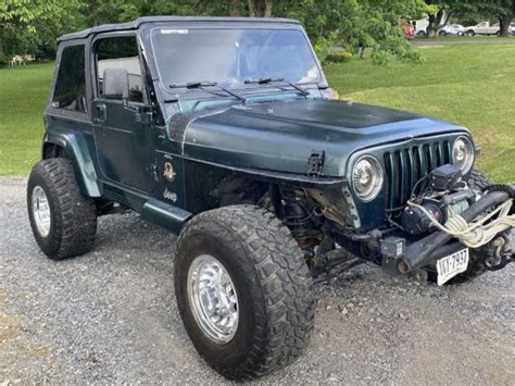 2000 Jeep Tj With 15x12 73 Mickey Thompson Classic Iii And 33 12 5r15 Mastercraft Courser Mxt