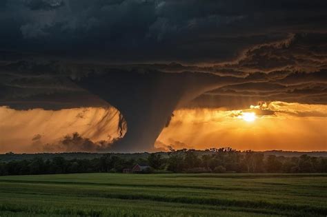 default tornado  sun setting   premium ai generated image