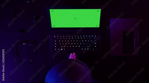 Hacker hacking system on a laptop. Green Screen Mock-up Display. Stock ...