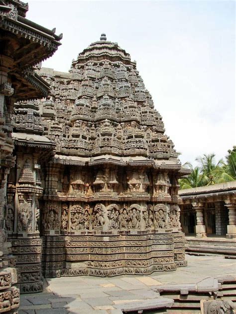 An Intricately Carved Stone Structure In The Middle Of A Courtyard