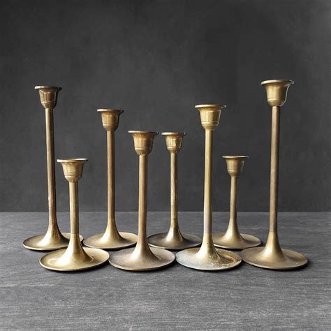 Lot Of 8 Brass Taper Candle Holders Gold Graduated Taper Etsy Brass Tapered Candle Holders