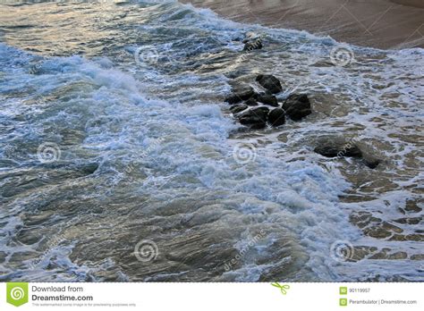 White Foam Swirling Around Rock In Sea Stock Image Image Of Rock