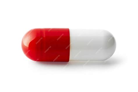 Premium Photo | Red pill isolated on white