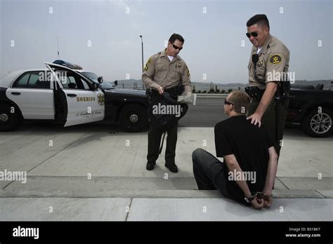 Arrested Handcuffs Man Police Hi Res Stock Photography And Images Alamy