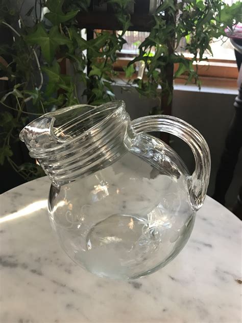 Vintage Clear Glass Tilted Ball Pitcher Leaves And Grapes Etching