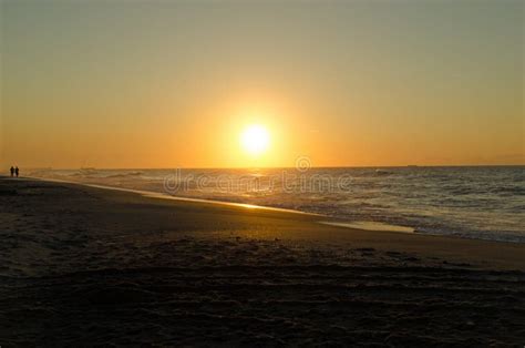 Golden Beach sun rise stock photo. Image of water, clouds - 111193558