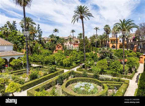 Gardens at Real Alcazar de Sevilla, The Royal Alcázar of Seville is a ...