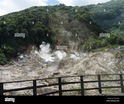 Wide shot of the drive-in volcano at the Sulphur Springs in St Lucia ...