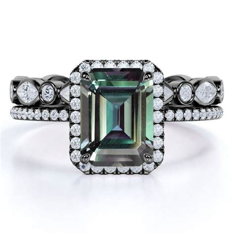 Jeenmata Framed Halo 2 Carat Emerald Cut Synthetic Alexandrite And Moissanite Wedding Ring Set