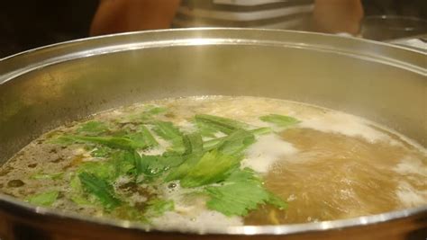 People Eating Suki Yaki Hot Pot Stock Footage Video 100 Royalty Free 32646178 Shutterstock