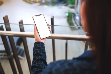 Premium Photo Rear View Of Woman Using Mobile Phone