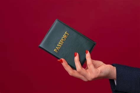 Premium Photo Side View Hand Holding Passport