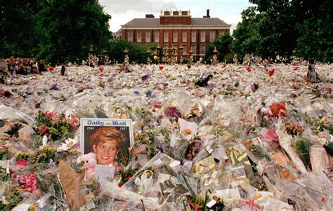 Flowers And Mourners Outside Kensington Palace In The Days Following