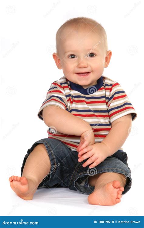 Cute Baby Boy Toddler Sitting And Holding Hand Royalty Free Stock