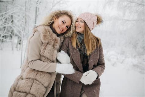 Photo Of Two Blonde Women On Walk In Winter Forest Stock Photo Image Of Hands Christmas