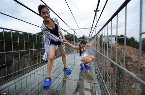 Tourists Walk China S New Glass Bottom Walkway Suspended 600 Feet Above The Ground Daily Mail